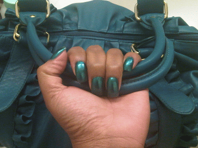 The color is so fly. And it matches my purse! :)