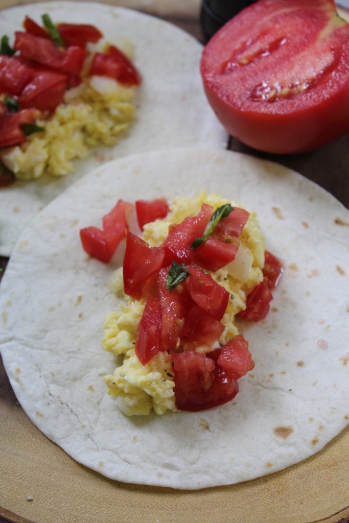 For busy families on the go, don't skip the most important meal of the day. Do breakfast on the go with these tomato basil breakfast burritos.