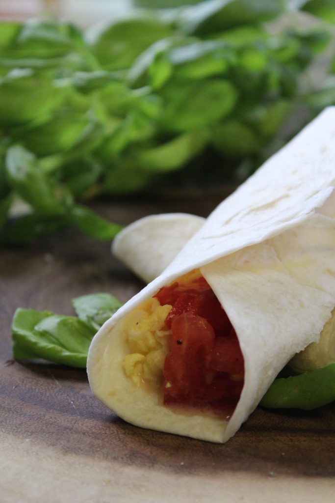 For busy families on the go, don't skip the most important meal of the day. Do breakfast on the go with these tomato basil breakfast burritos.