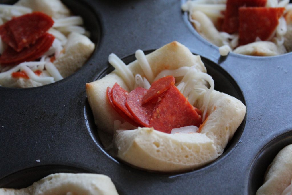 These fun and delicious mini pizza cups are a 30 minute meal that both you and your kiddos will love. Get the recipe.