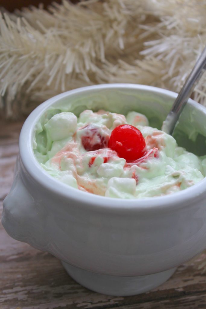 Grinch Fluff also known as Cherry Pistachio Fluff Recipe is a tried and true family treat for the holiday season everyone will love.